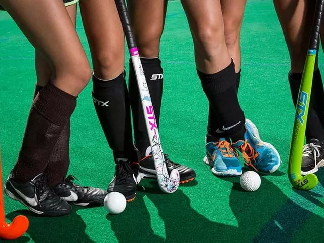 Why was artificial turf introduced in (Field) Hockey?